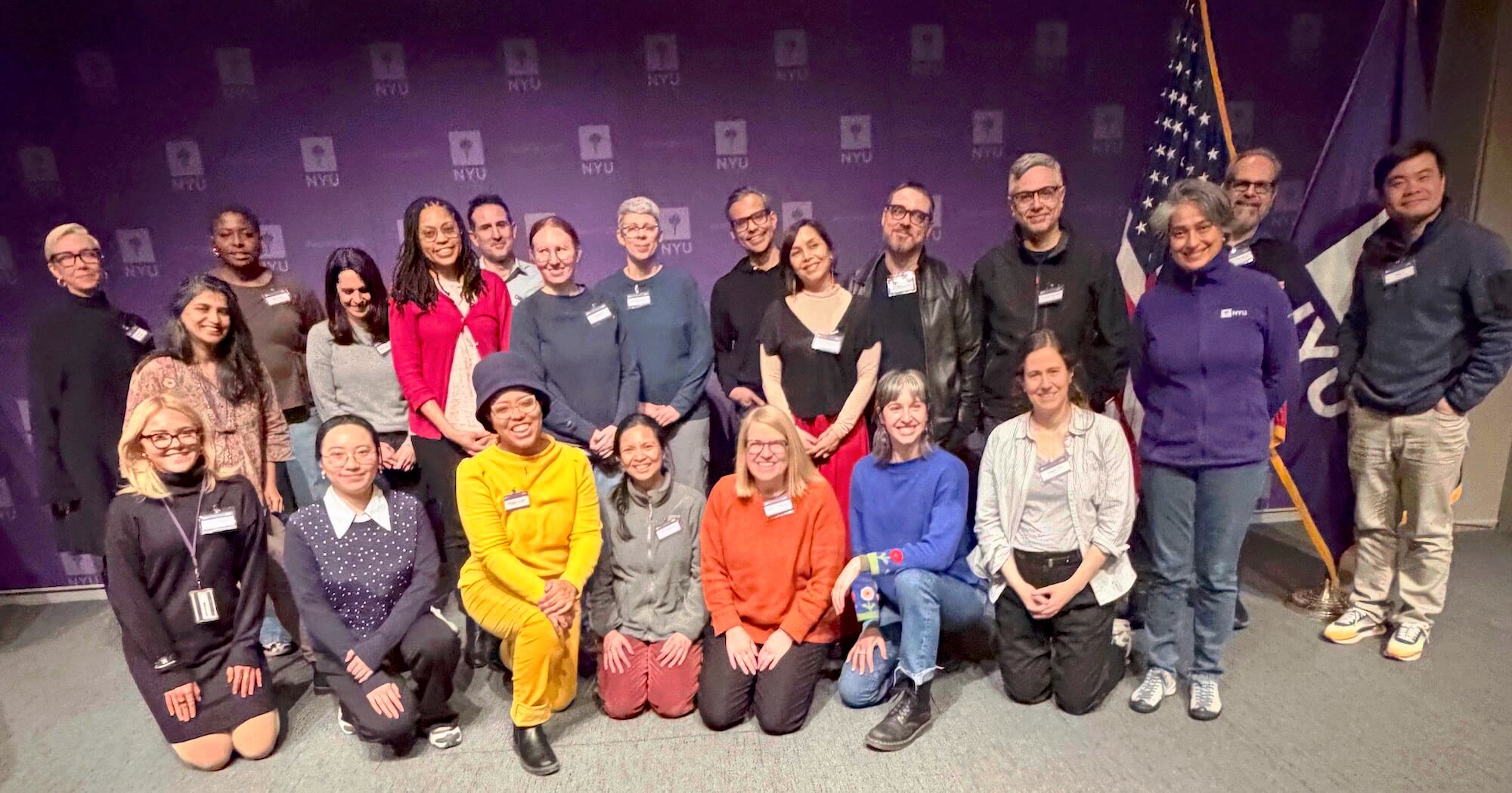 Group pose of Writing Salon participants gathered at NYU Washington DC with colleagues