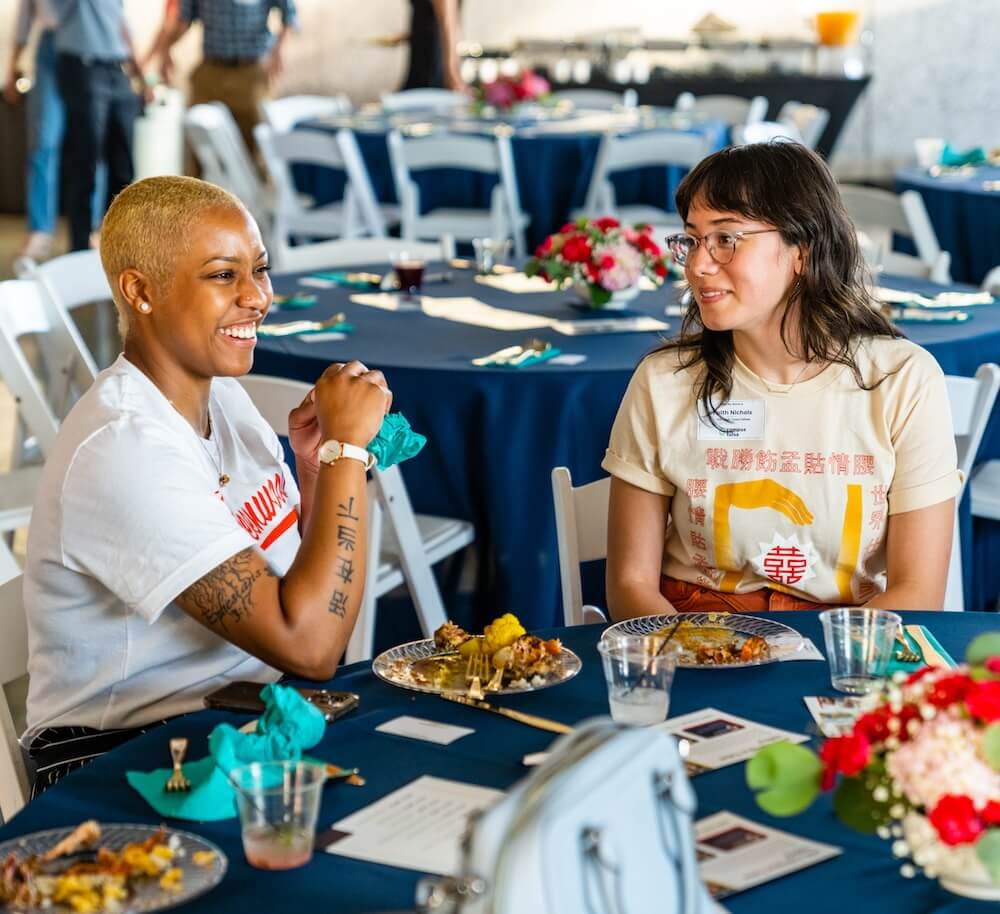 Two women at an event dinner