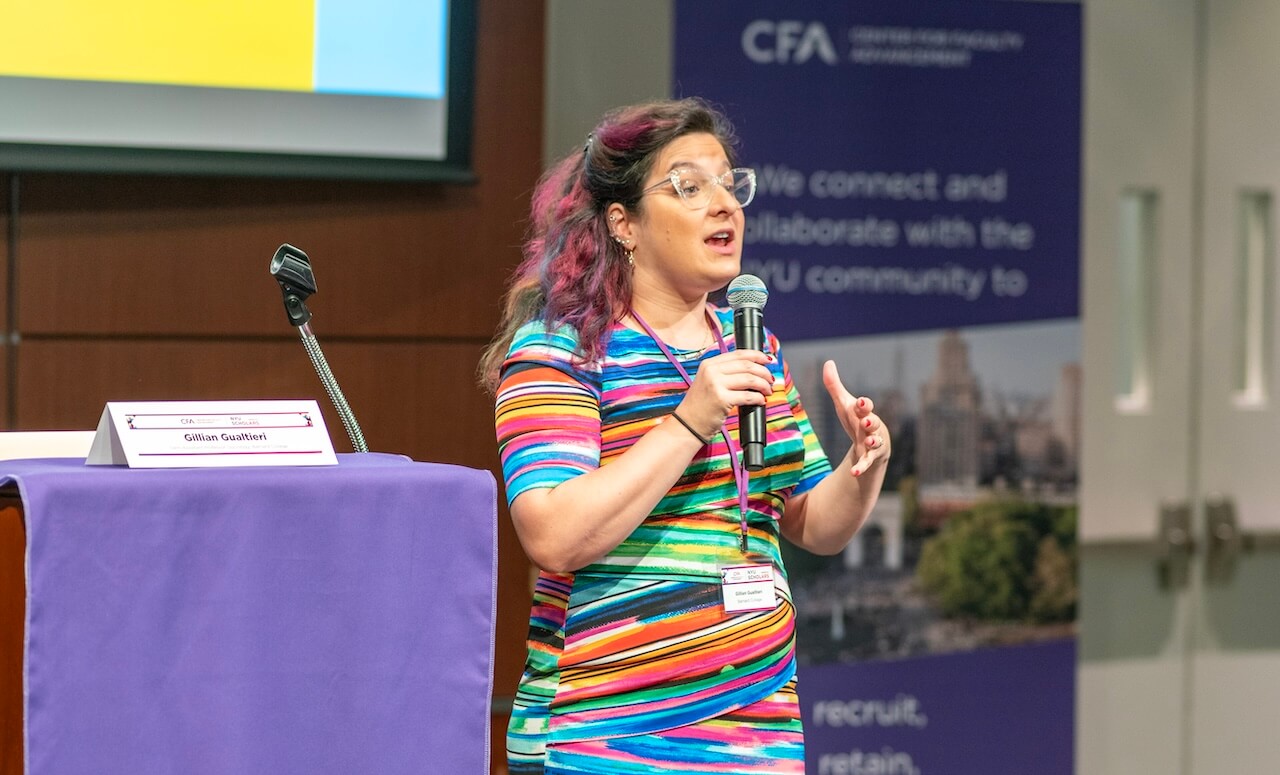 Gillian presenting to faculty at NYU Scholars Convention in June 2023